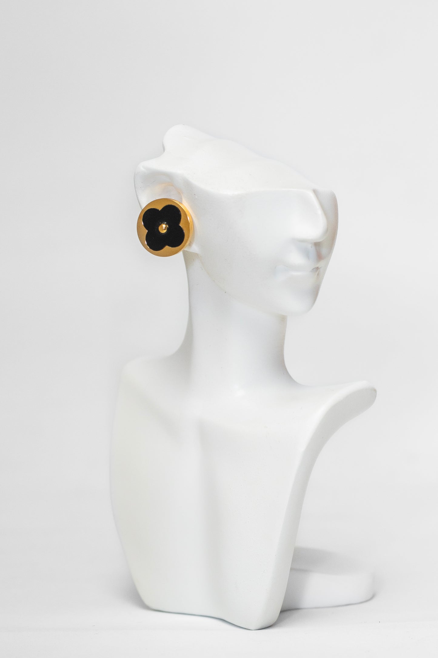 oval gold black earrings